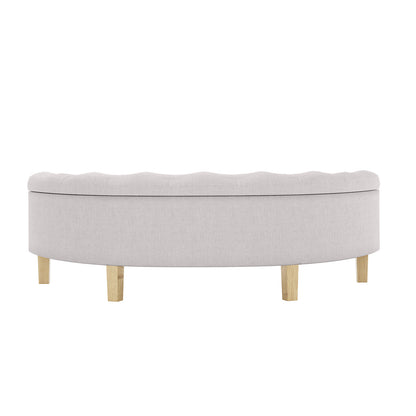Amina Half Round Linen Fabric Ottoman in Warm Grey features a tufted top, semi-circular design, and six short wooden legs, enhancing elegance and functionality with storage beneath its cushion.