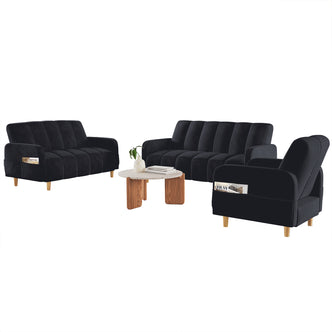 Anica 6 Seater Velvet Fabric Sofa Bed Set in Black featuring channel-quilted loveseats and armchair, a terrazzo-style coffee table, and built-in side pockets with magazines against a white background.