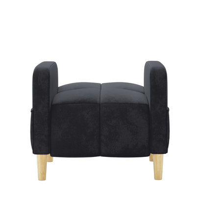 Anica Single Seater Velvet Sofa Chair in Black, featuring a black upholstered design with four light wooden legs and slightly raised padded arms, showcasing a stylish and versatile accent piece.
