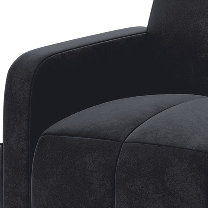 Anica Single Seater Velvet Sofa Chair in Black, featuring a close-up view of its padded seat cushion, squared-off armrest, and backrest, all enveloped in smooth, slightly textured fabric.