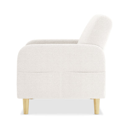 Side view of Anica 6 Seater Boucle Sofa Bed Set in Cream White, showcasing a modern armchair with a softly rounded, textured fabric shell and light-wood, tapered legs.