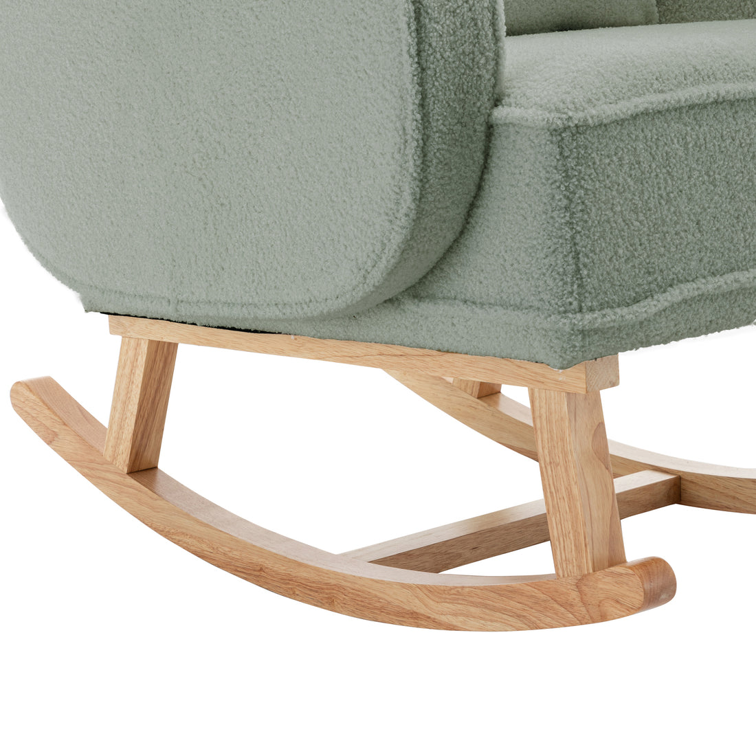 Aura Boucle Rocking Chair with Ottoman in Mint Green featuring sherpa-style fabric and pale wood rocker rails and supports, highlighting its chic, modern design and inviting texture.