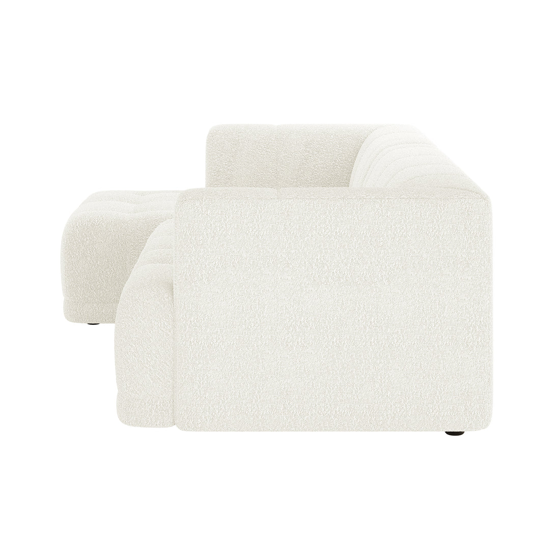 Averill 4 Seater Boucle Fabric Chaise Sofa in Light Beige, featuring an L-shaped design with low arms, deep tufted cushions, and a matching ottoman, epitomizes modern minimalism and comfort.