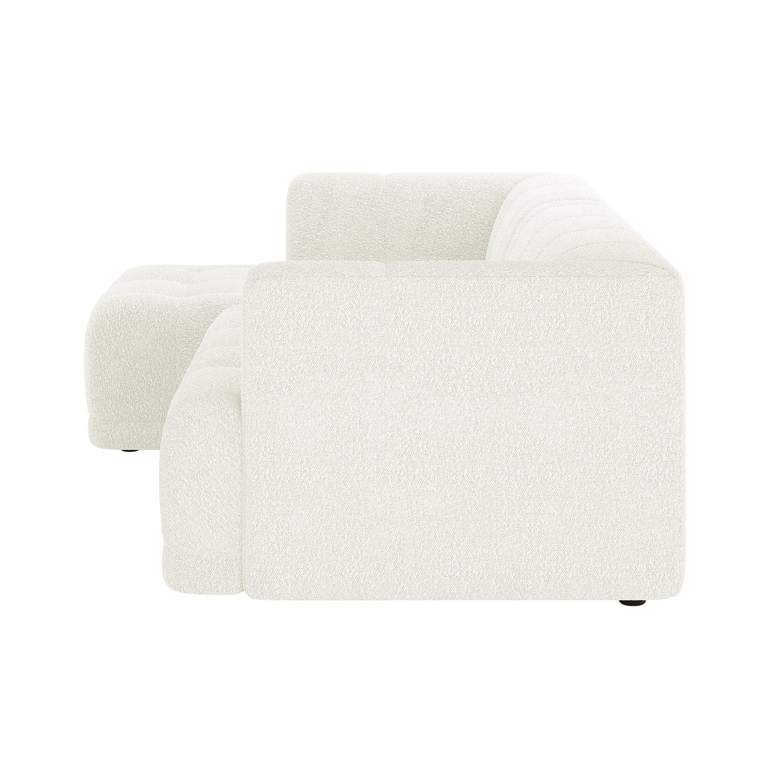 Averill 4 Seater Boucle Fabric Chaise Sofa in Light Beige, featuring an L-shaped design with low arms, deep tufted cushions, and a matching ottoman, epitomizes modern minimalism and comfort.