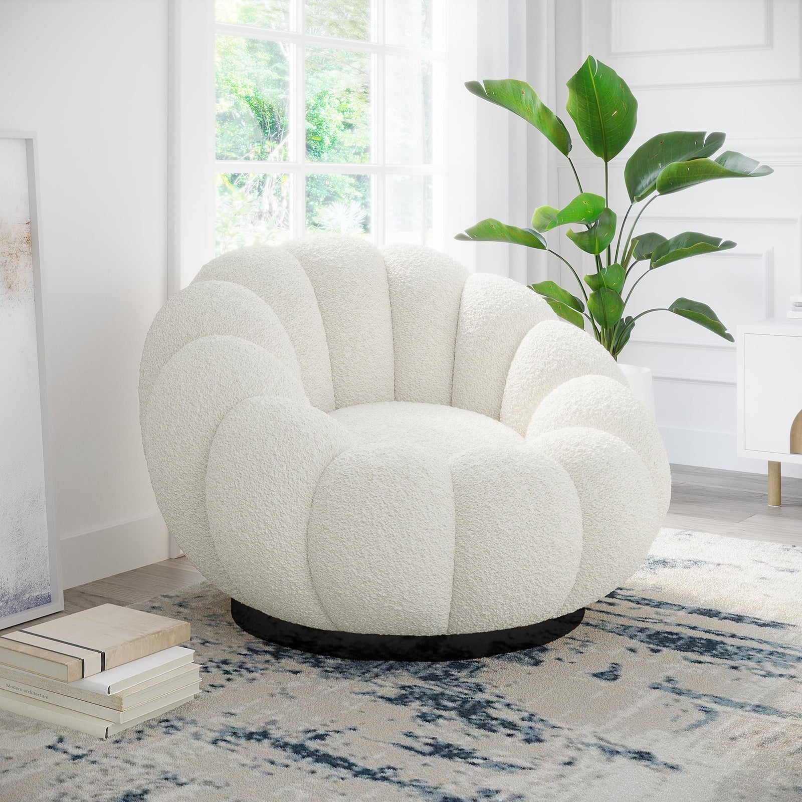 Beare Boucle Swivel Accent Chair in Cream White, featuring a scallop shape and bouclé fabric, on a dark swiveling base, placed atop a blue-gray rug with a nearby potted plant.