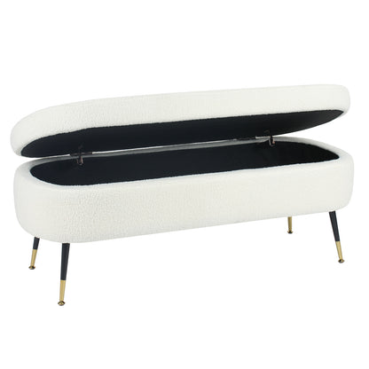 Bella 114cm Boucle Ottoman with Storage in Cream White, featuring a hinged top revealing a black-lined interior. Upholstered in soft bouclé fabric, it stands on slender metal legs with gold-tone caps.