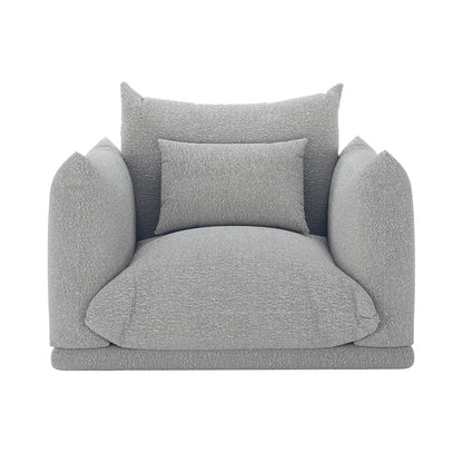 Berlin Single Seater Boucle Sofa with Pillow in Grey features oversized rounded armrests, a deep plush seat, tall back cushion, and additional lumbar pillow, showcasing modern elegance and inviting comfort.