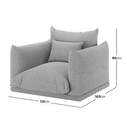 Berlin Single Seater Boucle Sofa with Pillow in Grey, featuring a low-slung design with overstuffed cushions and textured light-grey upholstery, perfect for adding comfort and style to any space.