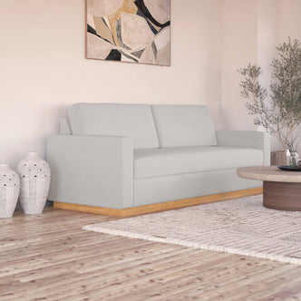 Celeste 3 Seater Hardwood Fabric Sofa Grey in a modern living room, featuring a plush design with removable cushions, rubber wood legs, and a sturdy eucalyptus hardwood frame for lasting comfort and style.