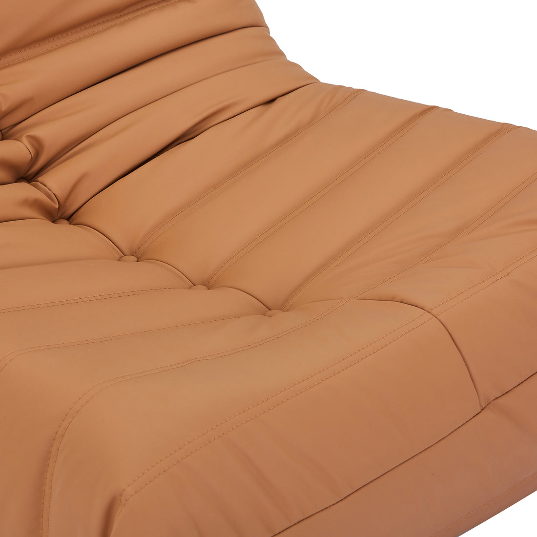 Claris PU Leather Upholstered Sofa Chair Caramel close-up showcasing the elegant quilted design and plush padding, highlighting its sleek contours and fine craftsmanship for a sophisticated, modern addition to any living space.