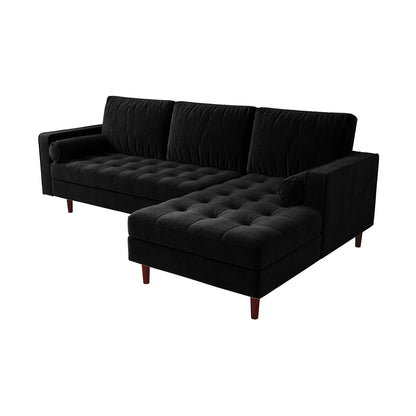 Claude 3 Seater Velvet Sofa with Chaise – Black, featuring plush cushions and a spacious chaise design. This close-up highlights its luxurious velvet texture and elegant structure, ideal for stylish lounging.