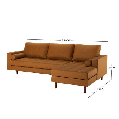 Claude 3 Seater PU Leather Sofa with Chaise in Tan Brown featuring cognac-brown finish, three-seat layout, right-hand chaise, loose back cushions, bolster pillows, and tapered wooden legs, measuring 254 cm wide.