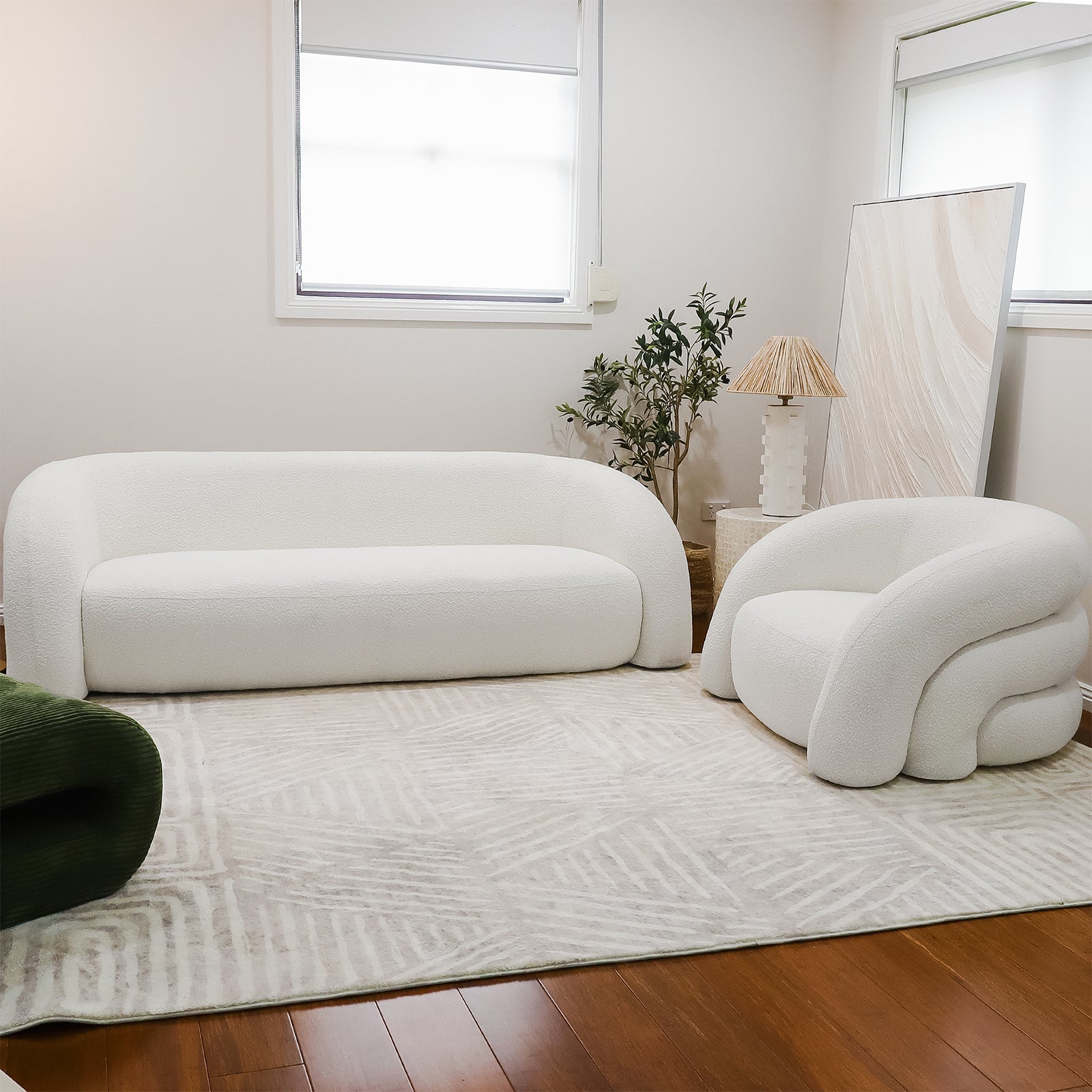 Lifestyle image of Clioz Bouclé 4 Seater Curved Lounge Package Eggshell White 