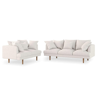 Colton 5-Seater Fabric Sofa in Cream White, featuring a modular design with two-seat and three-seat sections, slender wooden legs, and complemented by loose back and throw cushions for a contemporary appeal.