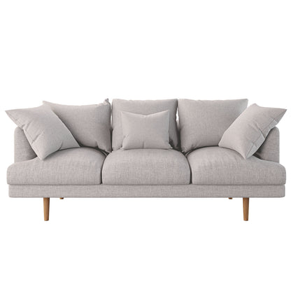 Modern Colton 5-Seater Fabric Sofa in Stone, featuring light-grey upholstery, three seats, slender wooden legs, and five matching cushions, offering a sleek, comfortable design perfect for contemporary living spaces.