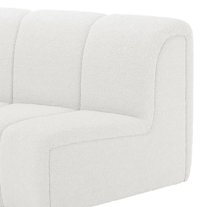Close-up of the Corina 3 Seater Modular Boucle Sofa in Cream White, showcasing its modern, channel-tufted design and bouclé-style upholstery, highlighting the corner or arm section of this elegant sofa.