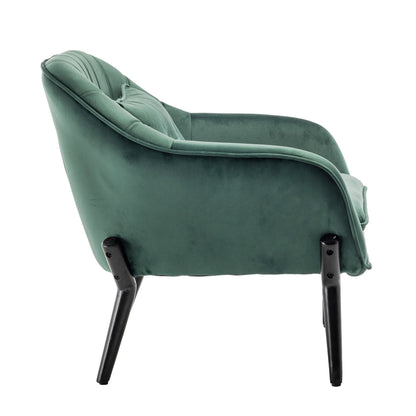 Ellen Velvet Accent Armchair in Dark Forest Green, featuring soft emerald-green velvet upholstery, curved tufted back, and padded arms, supported by slender black legs for a stylish, modern look.