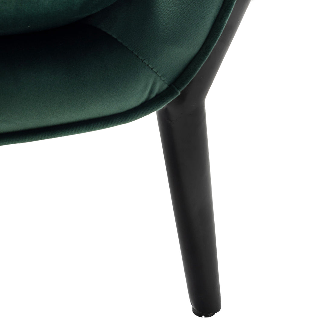 Close-up of the Ellen Velvet Armchair in Dark Forest Green, highlighting the plush velvet upholstery and sleek black tapered leg, showcasing its elegant and luxurious design against a plain backdrop.