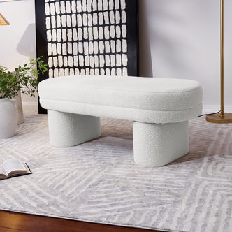 Close-up of the Elzan Bouclé Upholstered Bench in Eggshell White, showcasing its curved, plush bouclé texture and modern design, emphasizing its elegant and versatile addition to contemporary interiors.