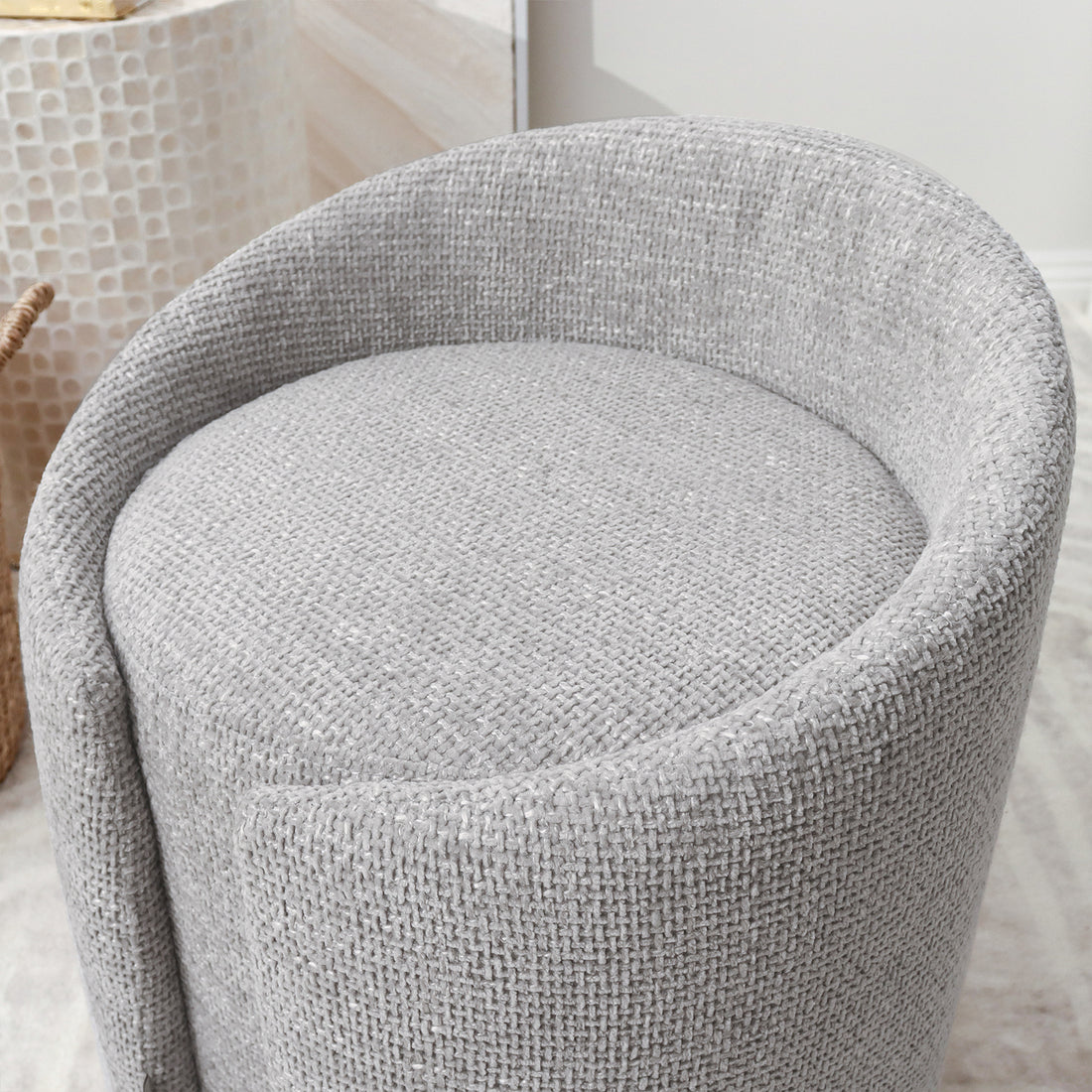Close-up of the Emiken Chenille Ottoman Stool in Warm Grey, showcasing its soft chenille fabric and elegant curved design. Ideal as a vanity chair or comfy ottoman, with solid wood frame and plush padding.