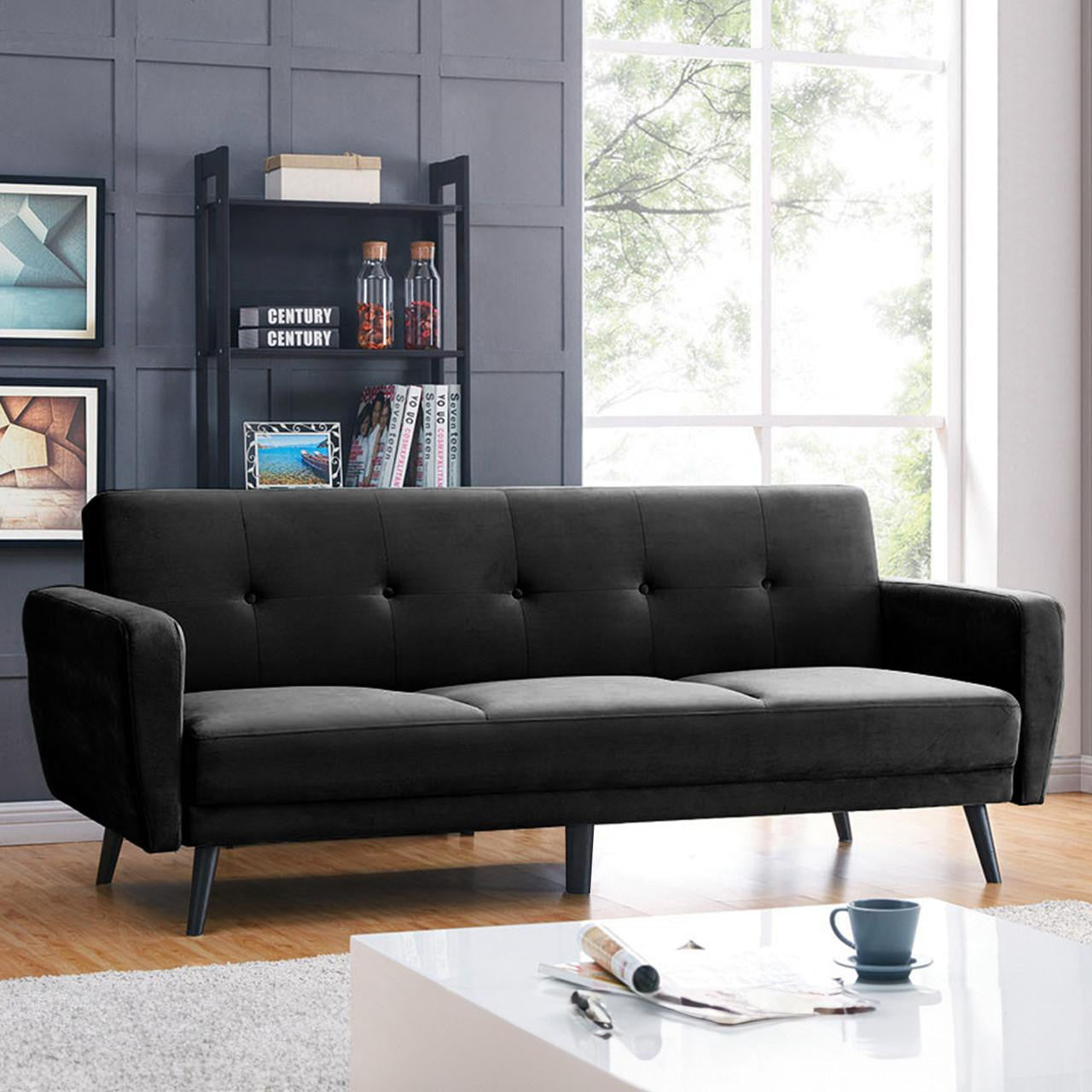 Esben 3-Seater Velvet Sofa Bed - Black in a stylish room setting, showcasing its plush velvet upholstery, rolled arms, and wooden legs, highlighting its transformative design from sofa to bed. Perfect for modern interiors.