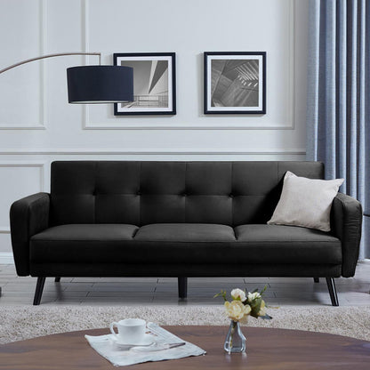 Esben 3-Seater Velvet Sofa Bed - Black on display, showcasing its sleek design with rolled arms and wooden legs on a black couch, highlighting its stylish and modern appeal.