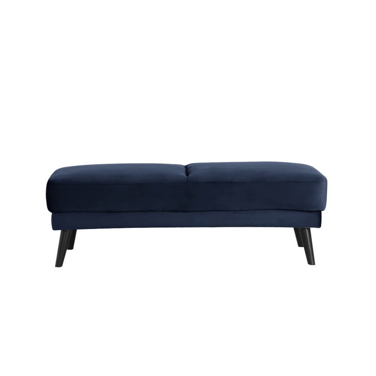 Esben Velvet Fabric Ottoman in Navy Blue, featuring a rectangular shape with a tufted top and splayed black legs, offers a luxurious touch to any living space.