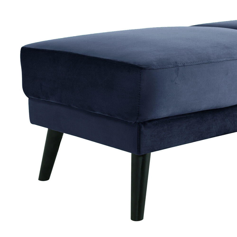 Esben Velvet Fabric Ottoman in Navy Blue features a mid-century design with deep navy velvet upholstery and four tapered dark wooden legs, offering both style and functionality for seating or as a footrest.
