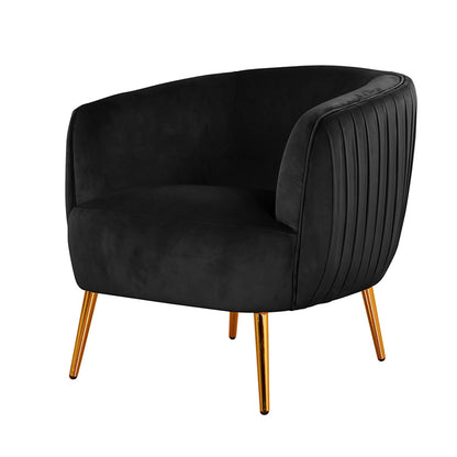 Evelyn Curved Velvet Sofa Accent Chair in Black, featuring luxurious velvet upholstery, gently curved back, and gold-tone tapered metal legs, exudes mid-century modern elegance and style.