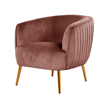 Evelyn Curved Velvet Sofa Accent Chair in Blush features a barrel design with dusty-rose velvet upholstery, channel-stitched back and arms, and gold-tone splayed metal legs for a luxurious, modern look.