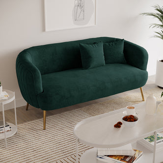 Evelyn 2 Seater Velvet Sofa Green features plush velvet upholstery, elegant curves, and sleek gold legs, offering a chic, mid-century modern look with cozy seating for two.