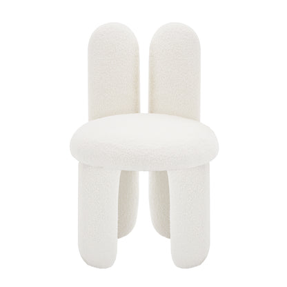 Flore Boucle Kids Chair with Bunny Ears in Cream White, featuring a soft boucle fabric, rounded seat, pill-shaped legs, and playful bunny-ear backrest, designed for comfort and durability in children's spaces.
