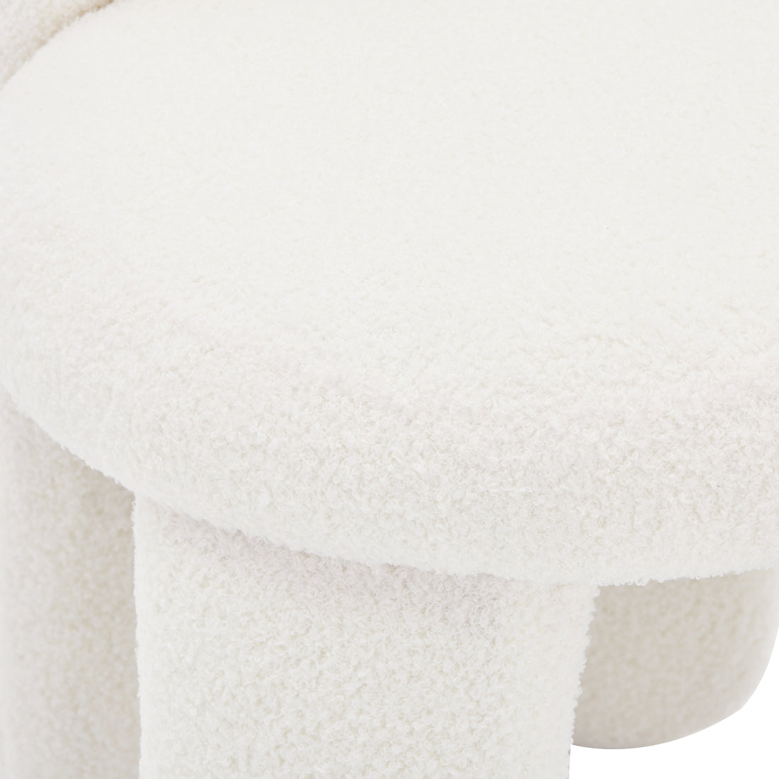 Flore Boucle Kids Chair with Bunny Ears in Cream White, featuring a round, boucle-upholstered top and cylindrical leg, showcasing its soft, nubby texture and playful design.