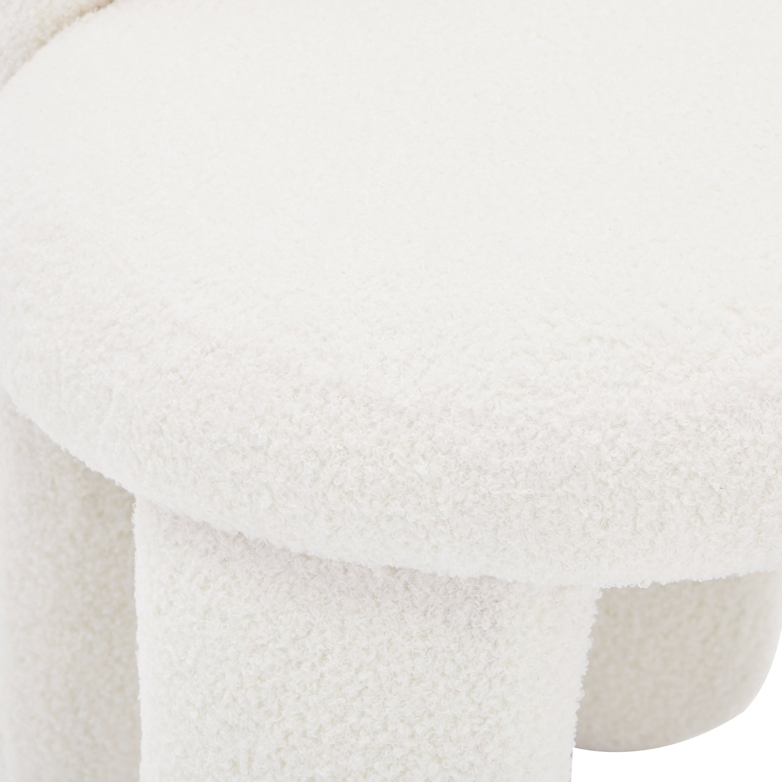 Flore Boucle Kids Chair with Bunny Ears in Cream White, featuring a round, boucle-upholstered top and cylindrical leg, showcasing its soft, nubby texture and playful design.