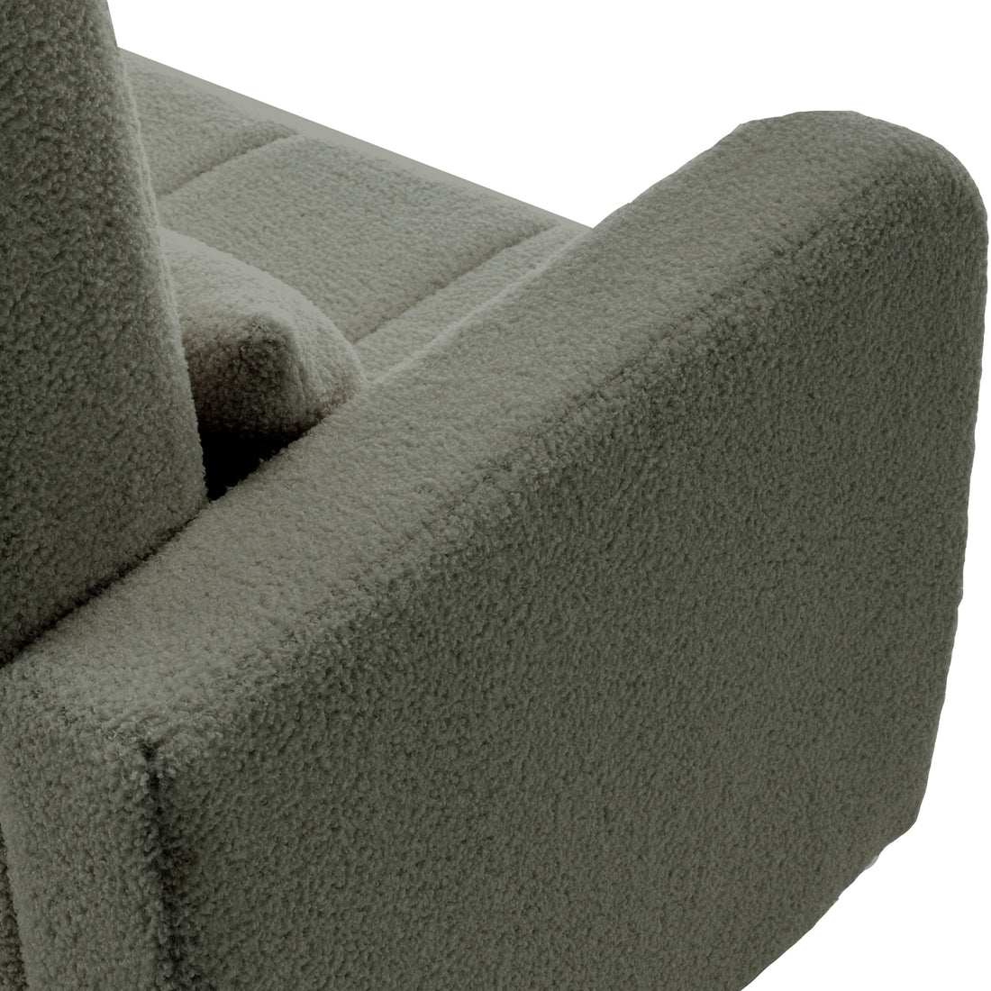 Close-up of the Gamila Boucle Rocking Chair with Ottoman in Green, showcasing the corner with an armrest and part of the seat/back cushions in looped bouclé fabric.