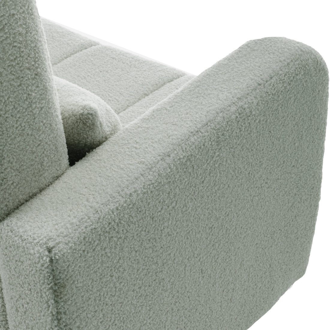 Close-up of the Gamila Boucle Rocking Chair with Ottoman, showcasing the light-green, textured bouclé fabric on the arm, highlighting the modern design and plush comfort ideal for relaxation.