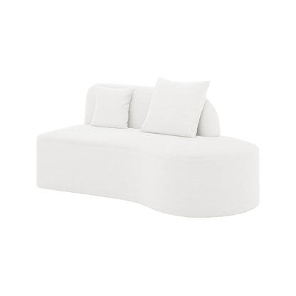 Hattie 4 Seater Boucle Sofa in Cream White features a modern curved design, upholstered in textured bouclé fabric with a low backrest, smooth base, and two matching square throw pillows.