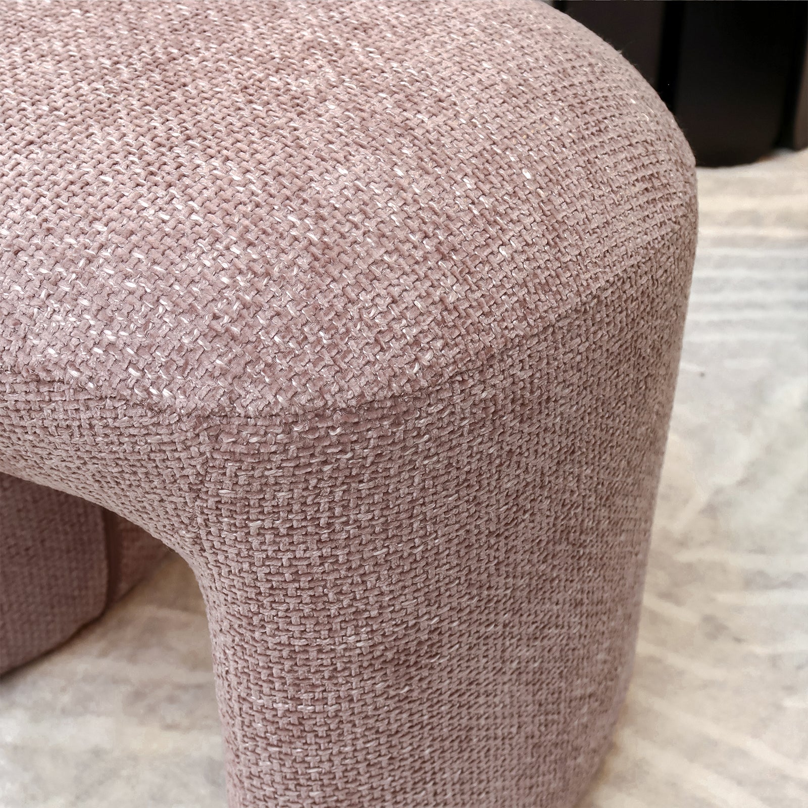 Hirokoz Chenille Ottoman Stool Light Pink with a textured, knitted surface, plush cushioning, and a sturdy wooden frame, offering a stylish and cosy addition to any indoor space.