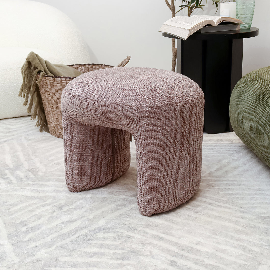 Hirokoz Chenille Ottoman Stool in Light Pink, showcasing its plush chenille fabric and solid wood frame, designed for versatile use as a footrest, seat, or stylish accent piece.