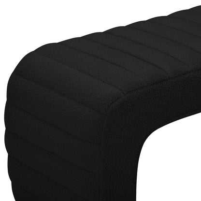 Josie Curved Boucle Fabric Bench Seat in Black features a modern U-shaped design with horizontal channel tufting, perfect for stylish extra seating or a footstool in contemporary spaces.