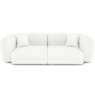 Kaelyn 3 Seater Modular Boucle Sofa with Pillows in Cream, featuring two armless seat modules with rounded backs, upholstered in luxurious bouclé fabric, and supported by short, turned wooden feet.