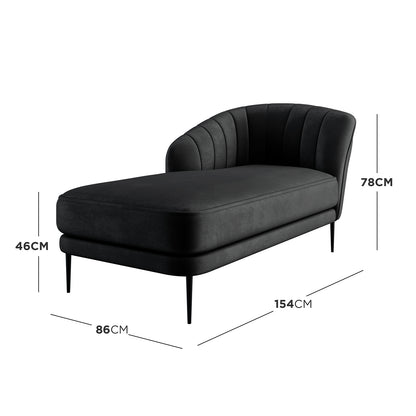 Kaj Velvet Daybed with Left Armrest in Black features a gently curved, channel-stitched back, thick padded seat cushion, and slender tapered legs. Dimensions are highlighted for overall length, width, and height.