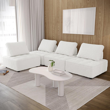 Kazumi 4 Seater Boucle Modular Sofa Set in Cream White, featuring four upholstered sections with back cushions, a kidney-shaped coffee table, and a geometric rug on light wood flooring.