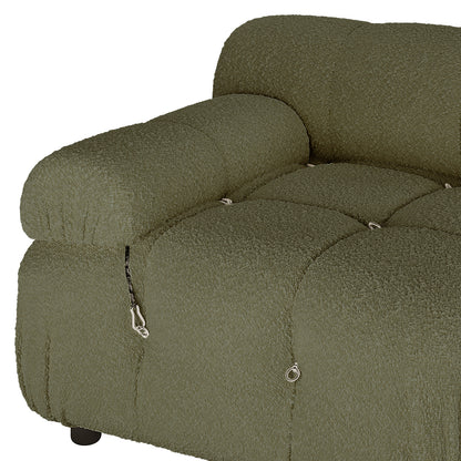 Close-up of the Keila 3 Seater Modular Tufted Boucle Sofa Set in Green, highlighting the tufted seat and arm cushions, with visible metal rings and cord loops in the seams.