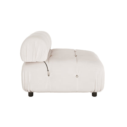 Keila Modular Tufted Single Sofa in Cream Velvet features a low-profile design with tufted seat pillows, adjustable back cushion, ring-and-strap accents, and short black feet, embodying modern style and comfort.