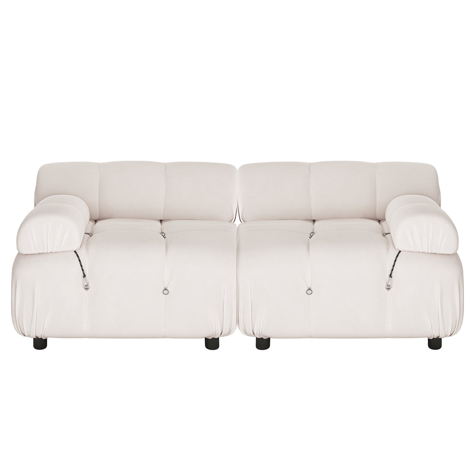 Keila 2 Seater Modular Tufted Sofa Set in Cream Velvet features a low-slung, puffy silhouette with tufted cushions, wide padded armrests, and short dark legs, exuding a contemporary, cozy charm.