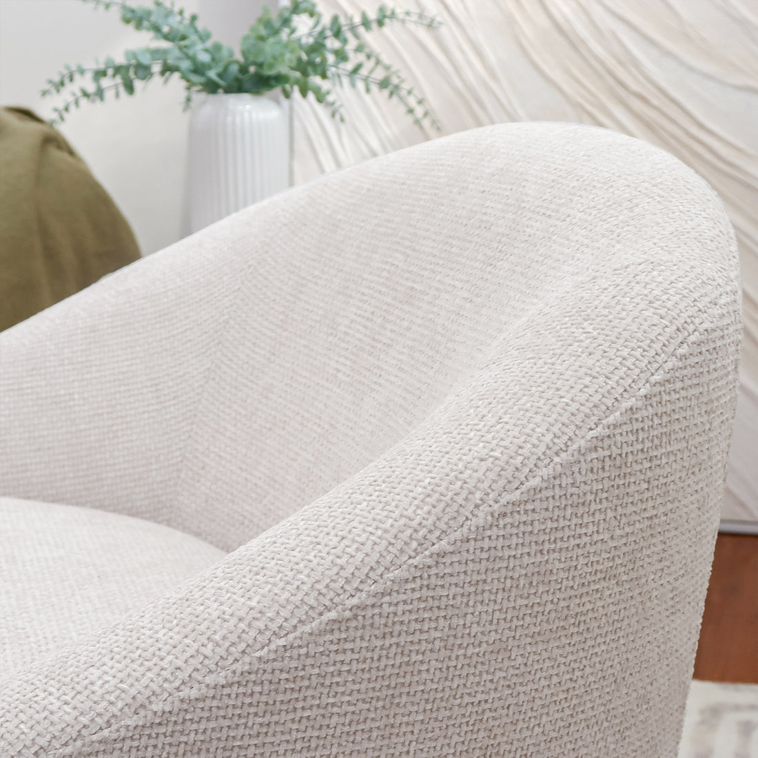 Close-up of the Kotrina Linen Chenille Accent Armchair, showcasing its textured chenille fabric and curved modern design, emphasizing the plush 9cm cushion for enhanced comfort and style.