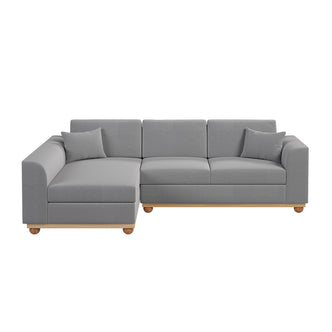 Laylah 3 Seater Fabric Hardwood Sofa with Left Chaise, showcasing its plush cushions, durable frame, and elegant wood accent legs, highlighting its blend of modern and farmhouse design.