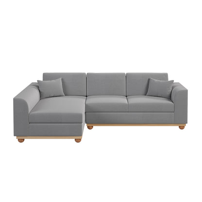 Laylah 3 Seater Fabric Hardwood Sofa with Left Chaise, showcasing its plush cushions, durable frame, and elegant wood accent legs, highlighting its blend of modern and farmhouse design.