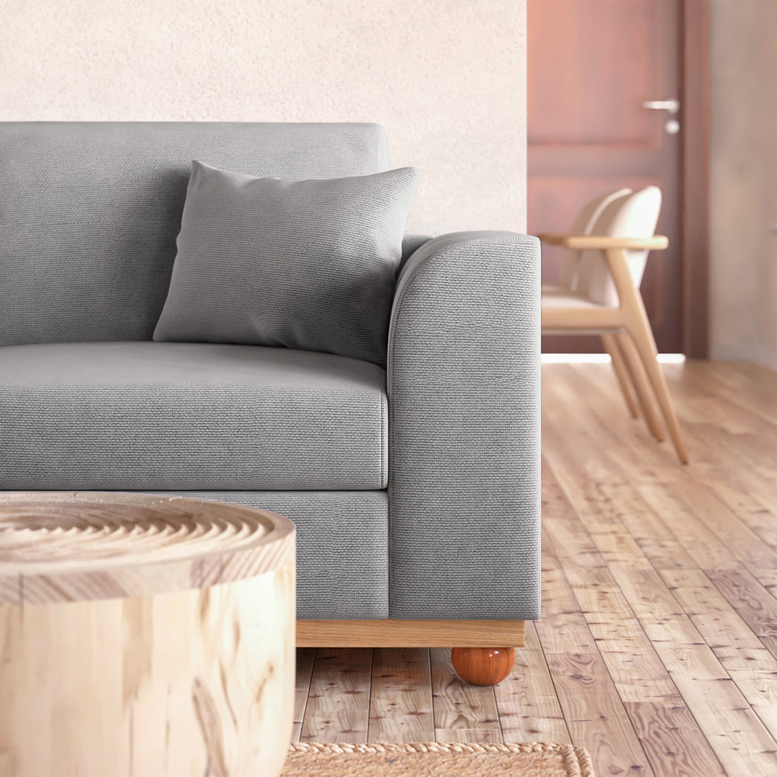 Close-up of the Laylah 3 Seater Fabric Hardwood Sofa With Left Chaise, showcasing durable polyester linen fabric, removable cushions, and sturdy rubber wood legs, emphasizing its modern and farmhouse-inspired design.